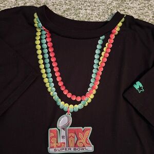 Super Bowl LIX 2025 black crop top with Mardi Gras beads design. New Orleans